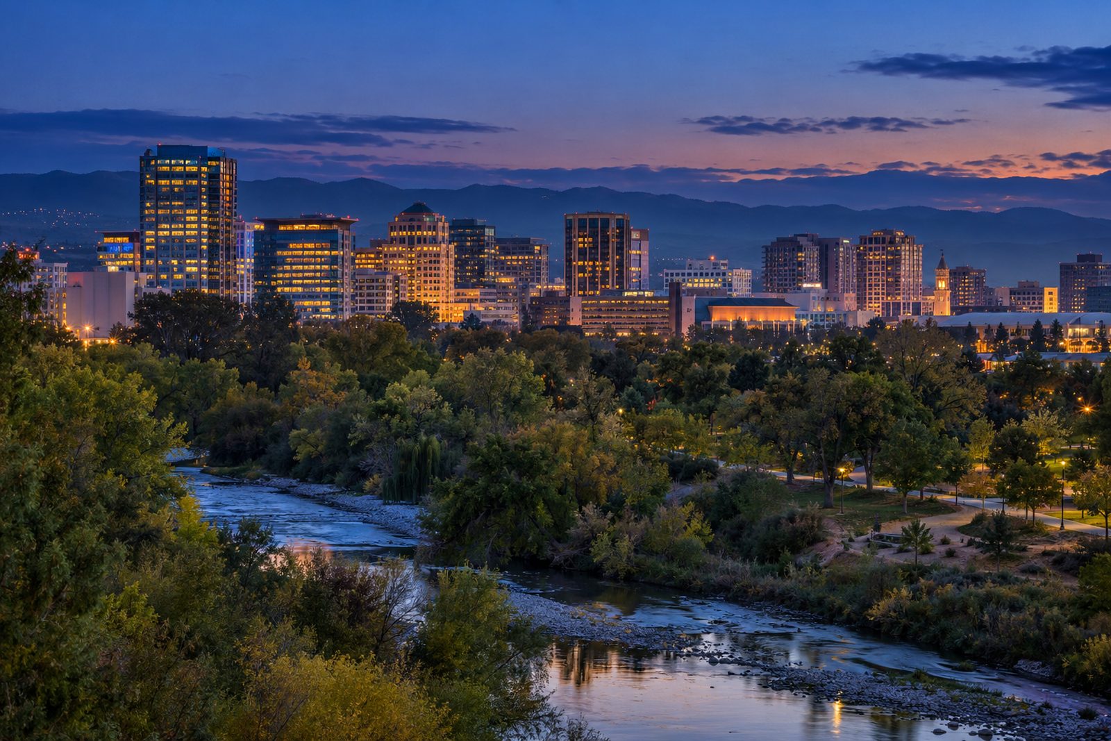 Downtown San Jose skyline at blue hour above Guadalupe River Park